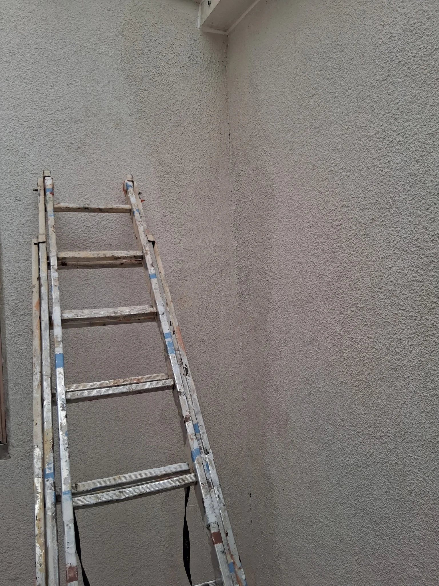Reparation fissures murs veranda - Resultat impeccable