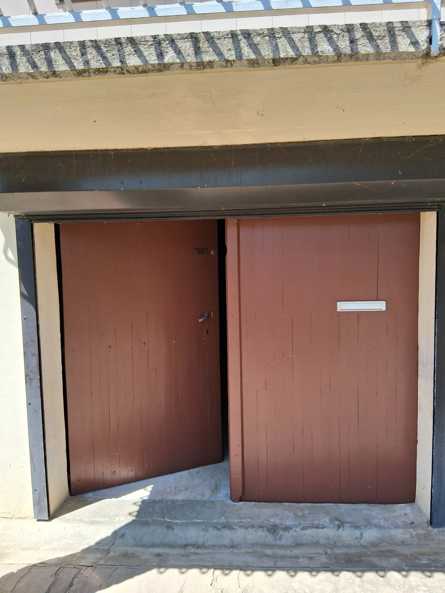 Rénovation porte garage - Esthétique et sécurité